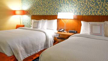 Premium bedding, desk, iron/ironing board, free cribs/infant beds