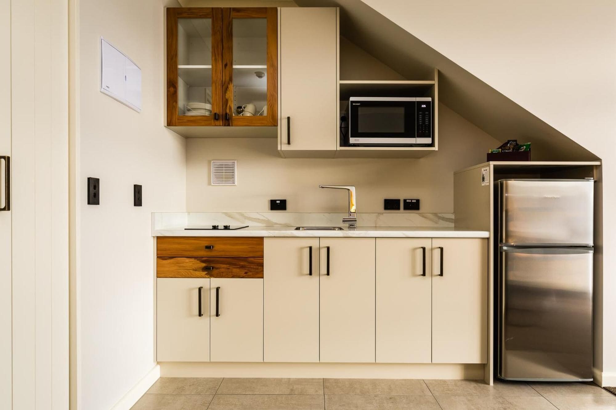Fridge, microwave, stovetop, coffee/tea maker
