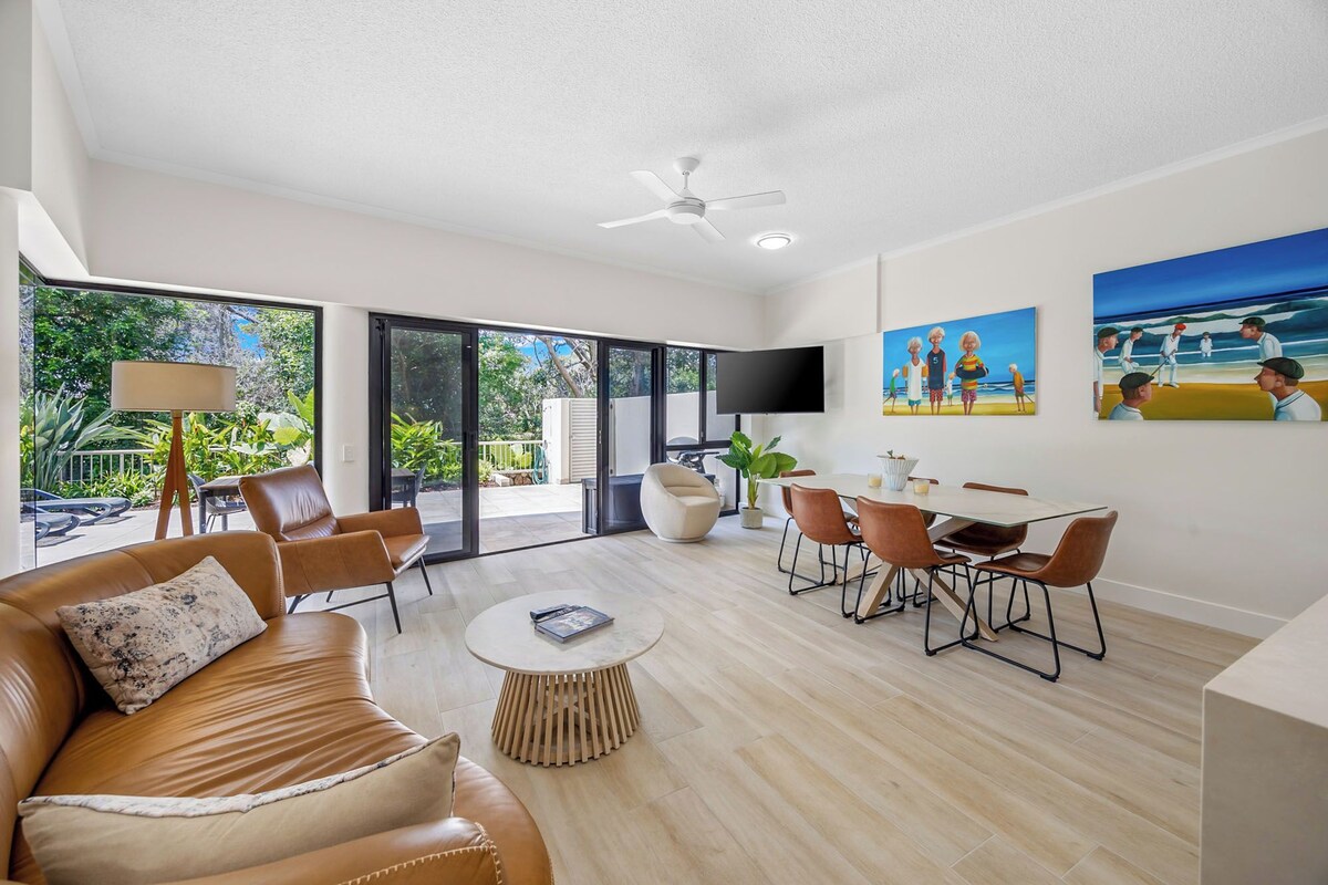 Deluxe Two-Bedroom Apartment - Beach Access Apt 1 | Living area | Flat-screen TV, DVD player