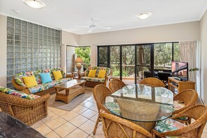 3 Bedroom Mid-Level Apartment  | Living area | Flat-screen TV, DVD player