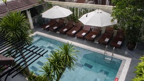 Outdoor pool, pool umbrellas, pool loungers
