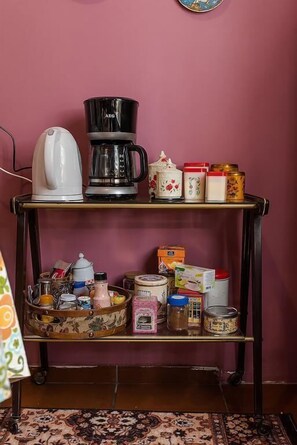 Full-sized fridge, microwave, cookware/dishes/utensils