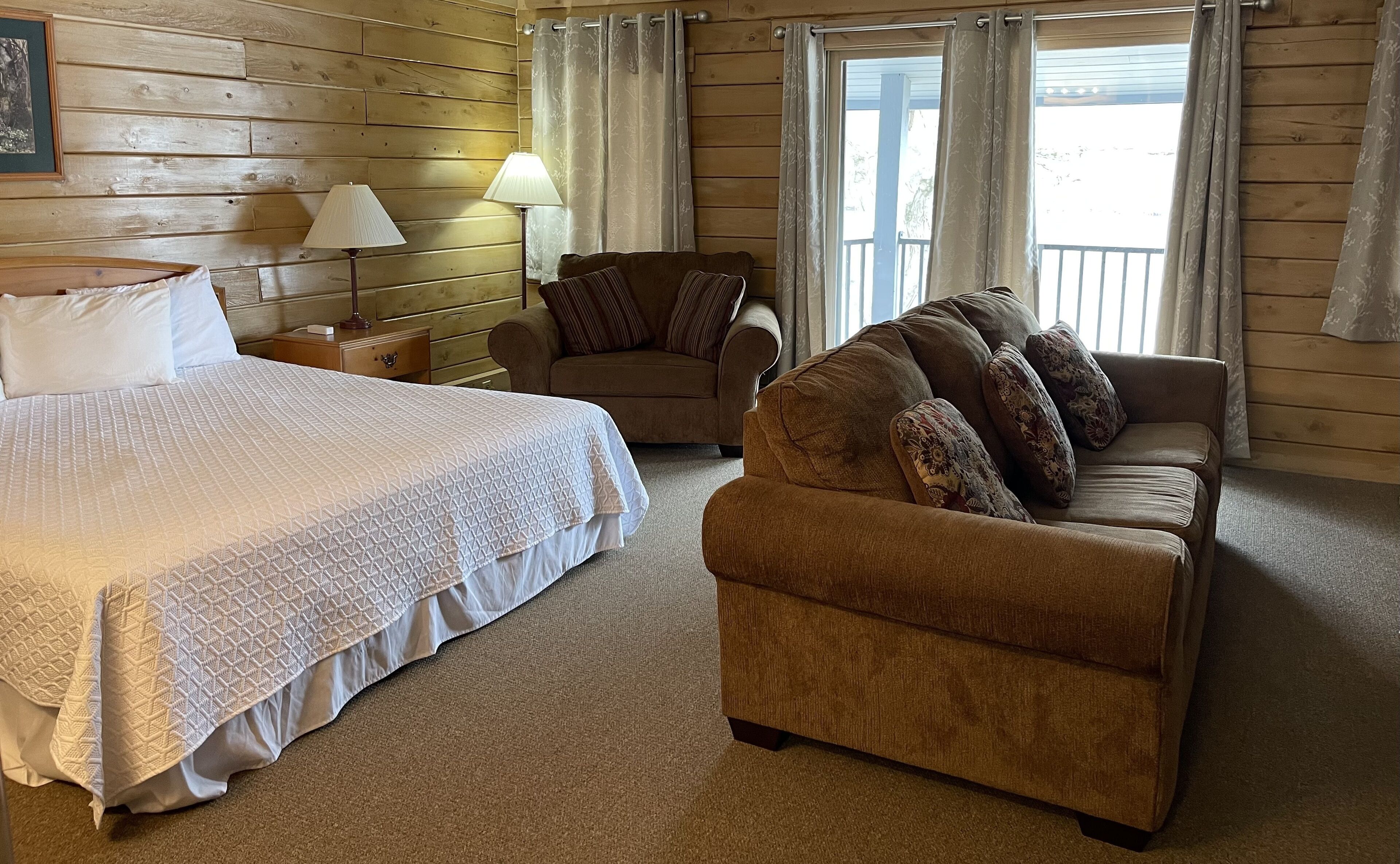 family room | 1 bedroom, desk, blackout curtains, iron/ironing board