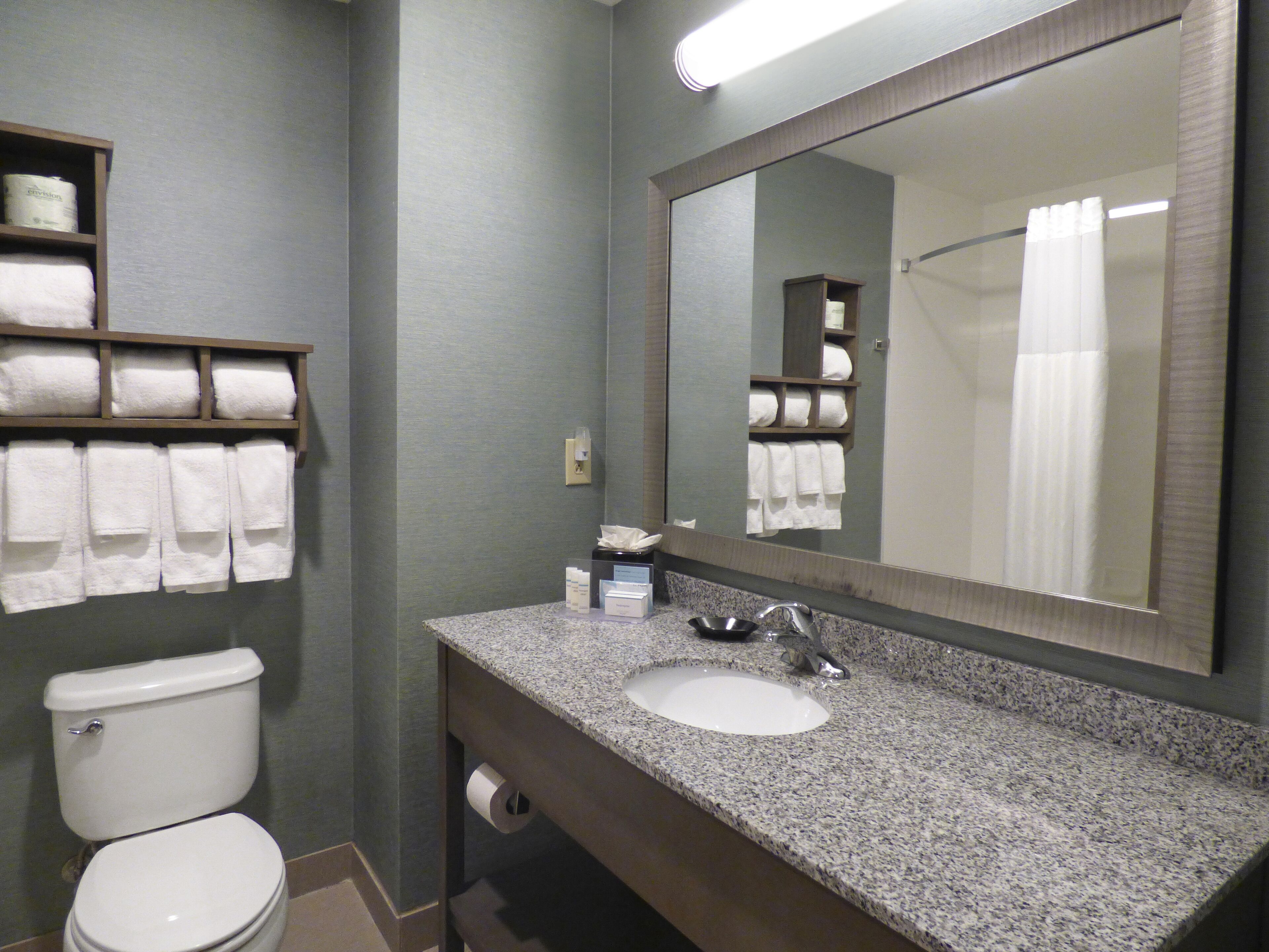 king sofabed microwave and refrigerator | bathroom sink