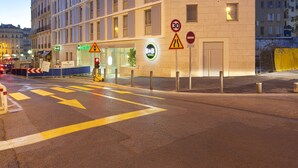A modern hotel with a flat facade, multiple windows, and a visible entrance. - B&B HOTEL Marseille Centre La Joliette (Marseille)