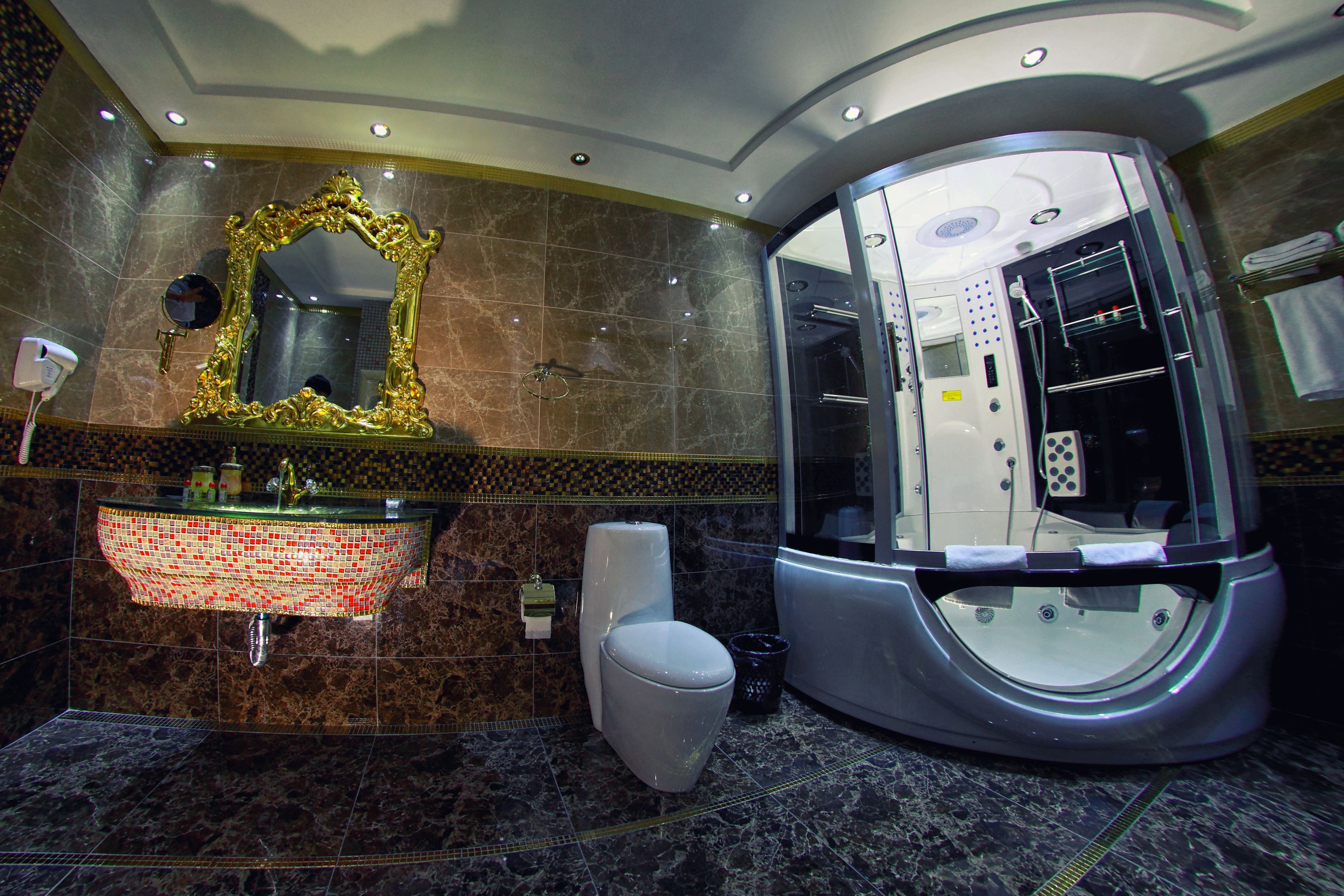 superior suite | bathroom | deep-soaking bathtub, free toiletries, hair dryer, bathrobes