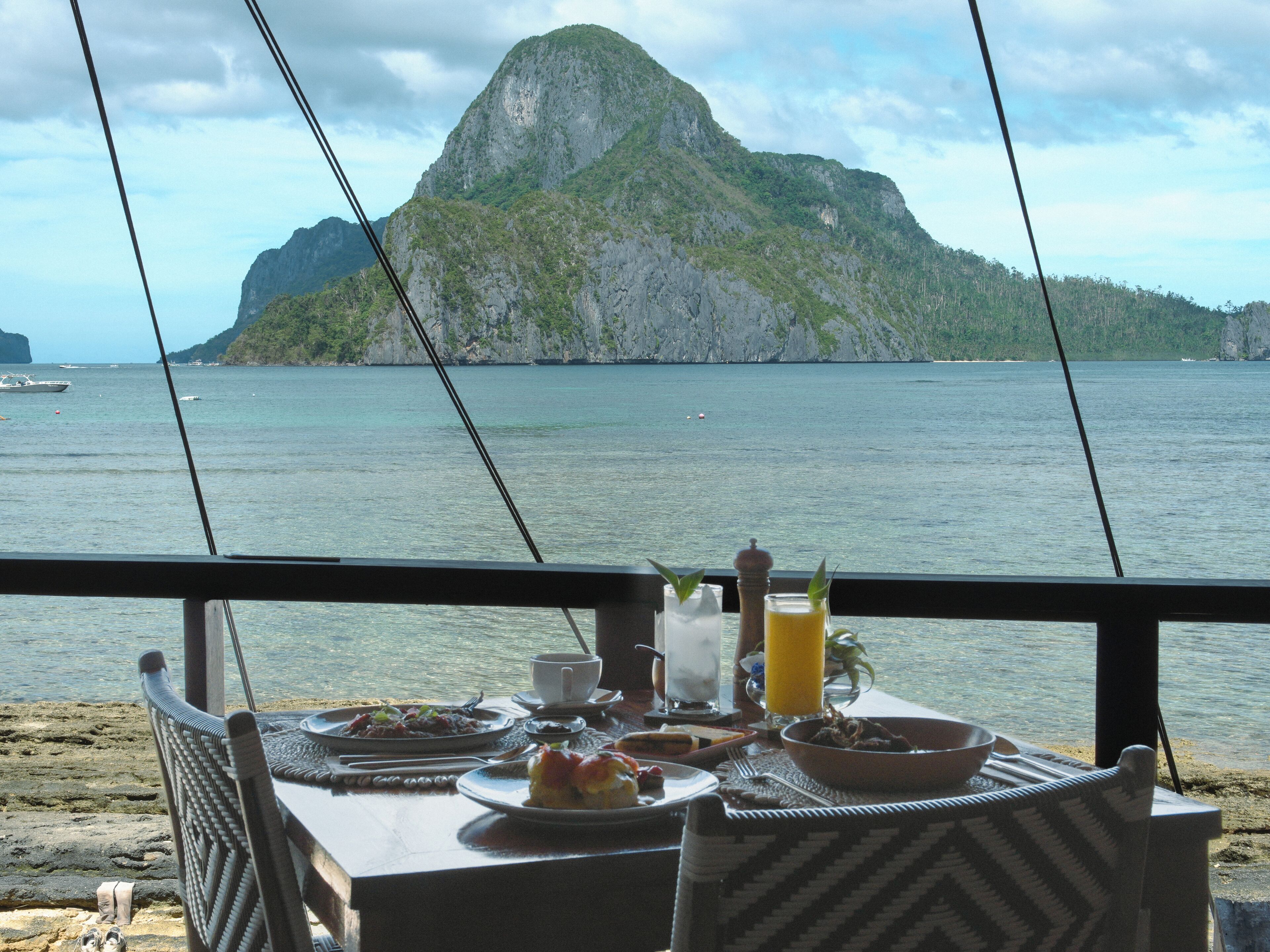 Breakfast, lunch, dinner served; international cuisine, pool views 