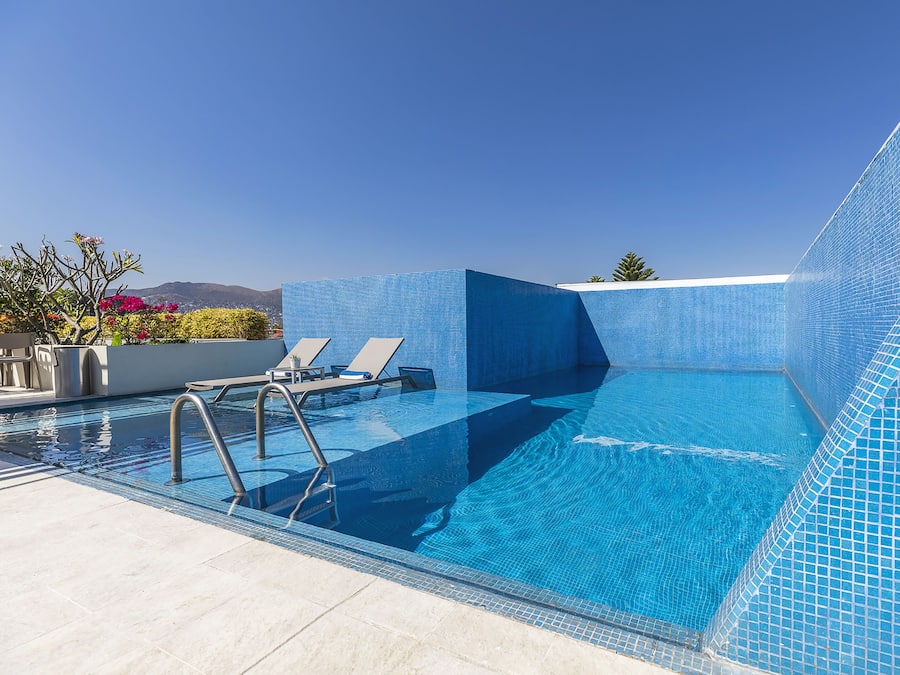 Outdoor pool, pool umbrellas, pool loungers