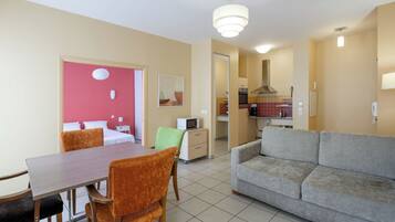 Apartment, 1 Bedroom | Living area | LCD TV, DVD player