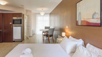 Superior Studio, 1 Queen Bed | Living area | LCD TV, DVD player