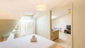 Apartment, 2 Bedrooms | 2 bedrooms, in-room safe, desk, soundproofing
