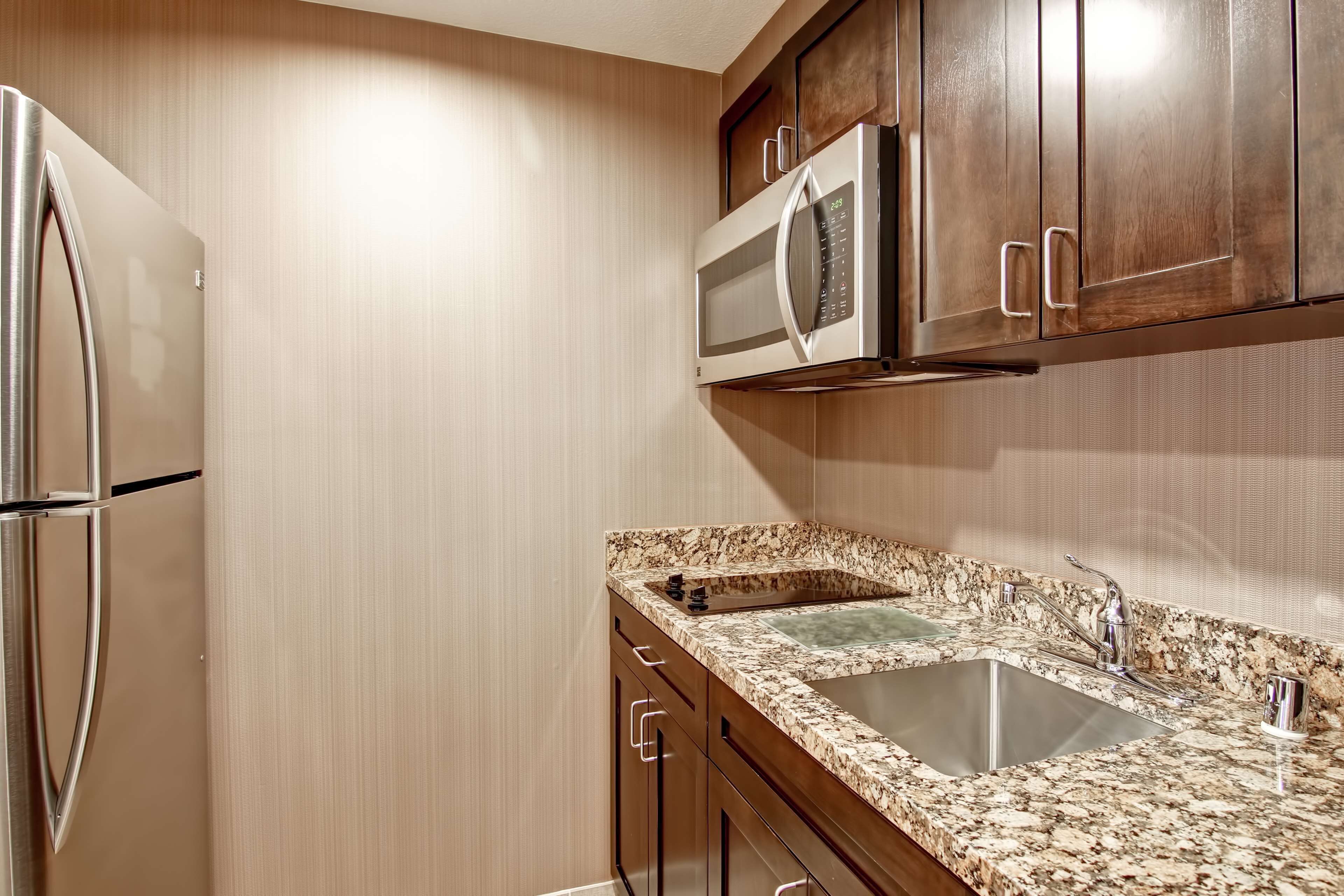 full-sized fridge, microwave, dishwasher, coffee/tea maker