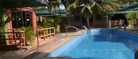 Outdoor pool, pool umbrellas, sun loungers