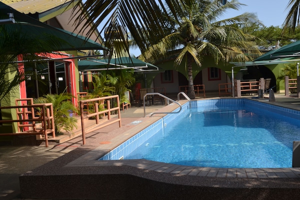 Outdoor pool, pool umbrellas, pool loungers