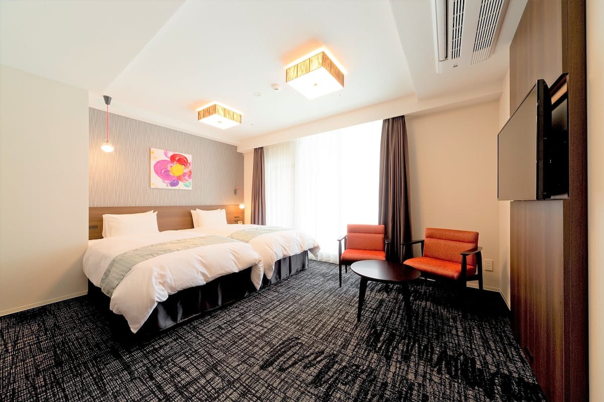 Deluxe Twin kamer (with extra bed) | Een kluis op de kamer, een strijkplank/strijkijzer, gratis wifi