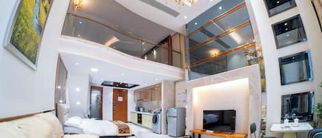 Luxury Suite, Multiple Beds | In-room safe, desk, soundproofing, iron/ironing board