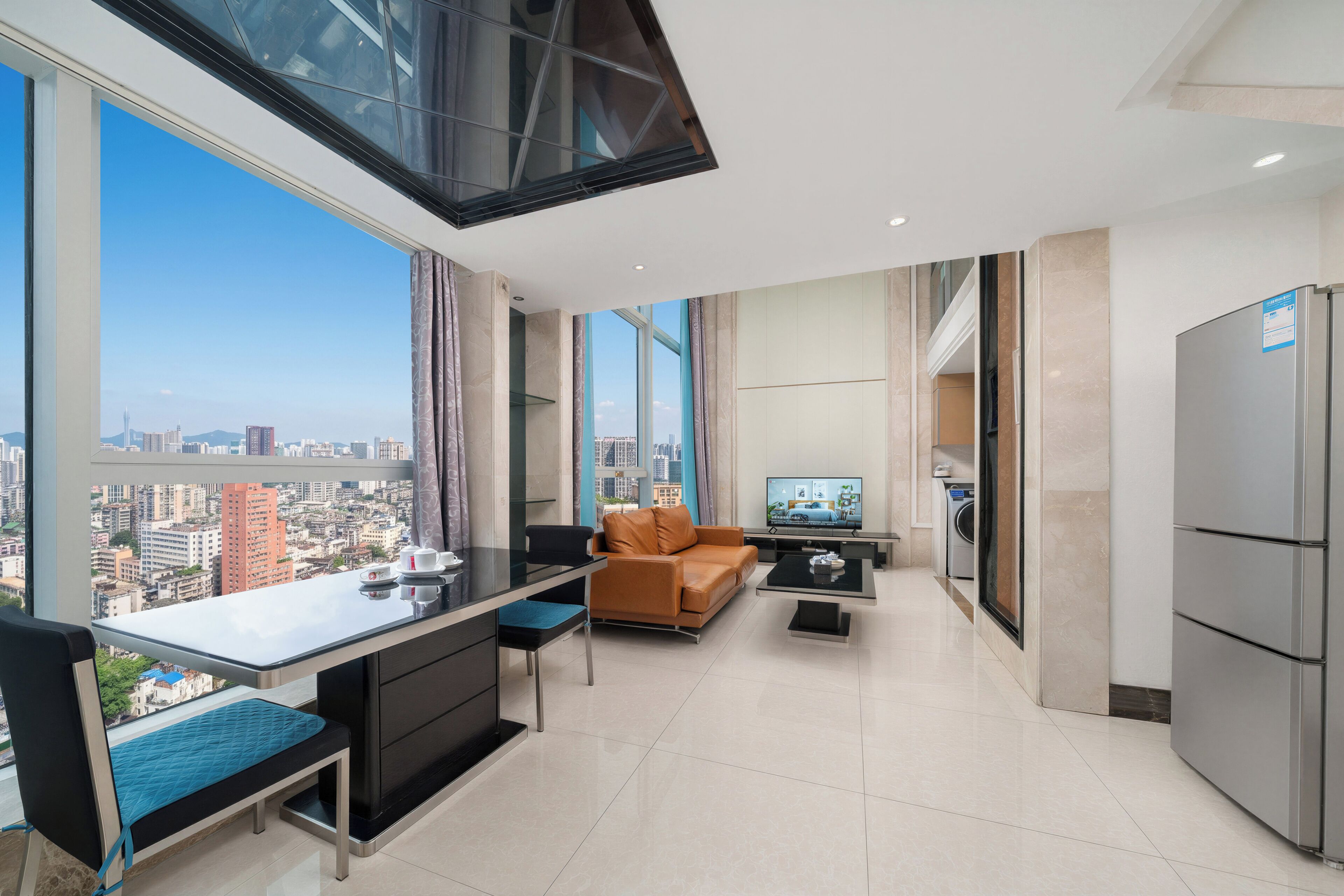 Deluxe Suite, 2 Bedrooms | Living area | Flat-screen TV