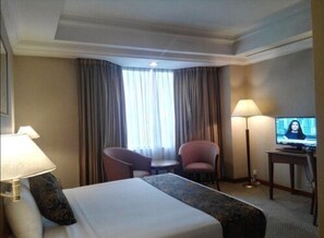 Executive Deluxe King | Literie de qualité supérieure, coffres-forts dans les chambres, bureau