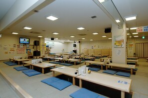 A classroom with tables and benches, a television, and educational posters on the walls. - Hidamarinoyu Flop House - Hostel (Takayama)
