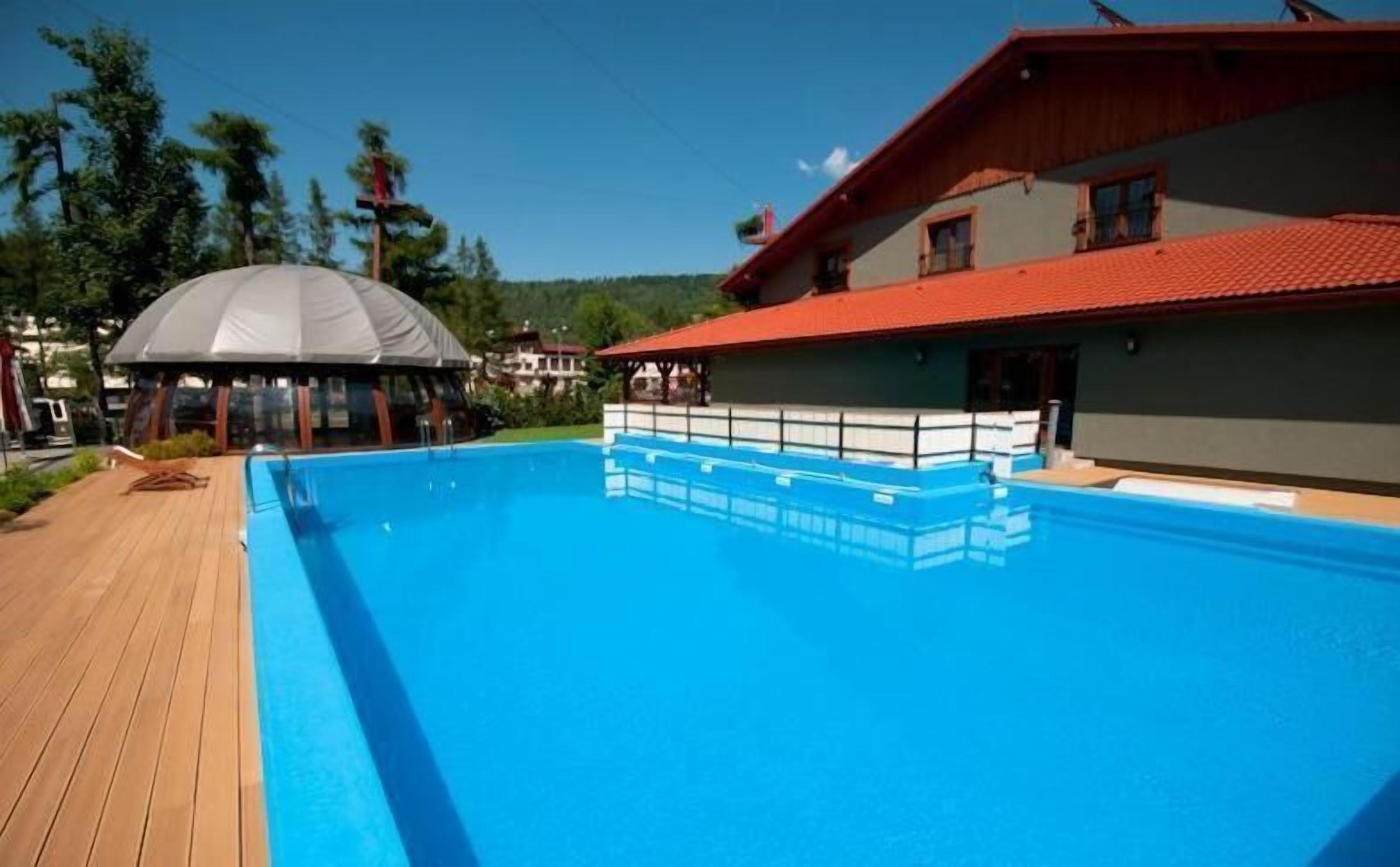 indoor pool, outdoor pool, pool umbrellas, pool loungers