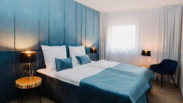 Literie de qualité supérieure, coffres-forts dans les chambres, bureau