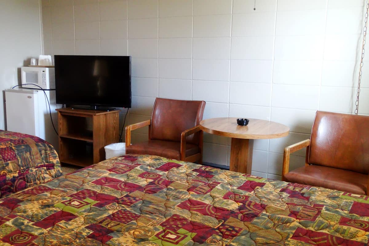 Double Room with Two Double Beds - Smoking | Blackout drapes, iron/ironing board, free WiFi, bed sheets