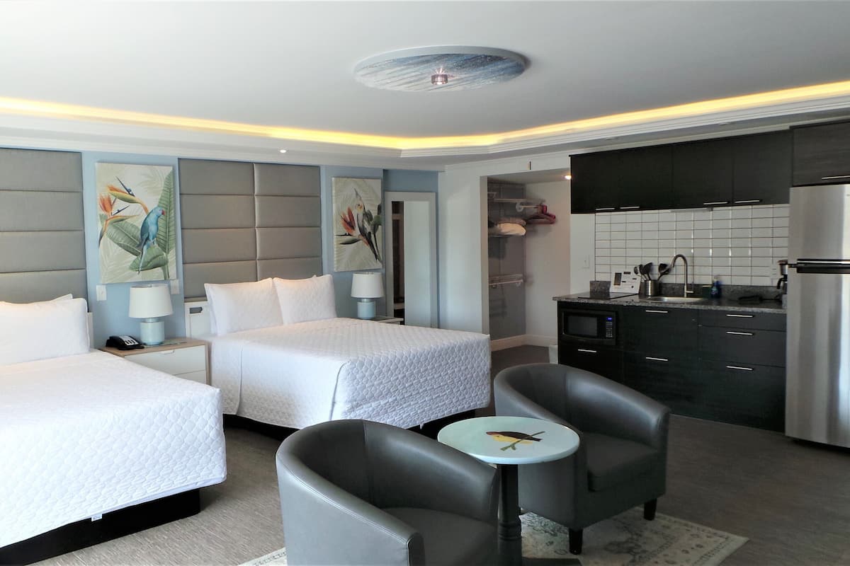 Deluxe Room, 2 Queen Beds, Kitchenette (with Balcony) | Individually decorated, individually furnished, iron/ironing board