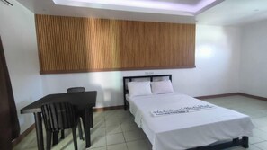 Desk, bed sheets - White Beach Resort Puerto Galera powered by Cocotel (Puerto Galera)