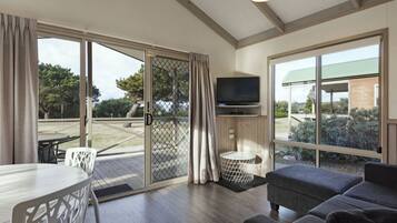 Deluxe 2 Bedroom Cabin - Sleeps 5 | Living area | LCD TV