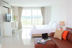 Deluxe Room | Desk, free WiFi, bed sheets - The Terrace Hotel (Nakhon Si Thammarat)