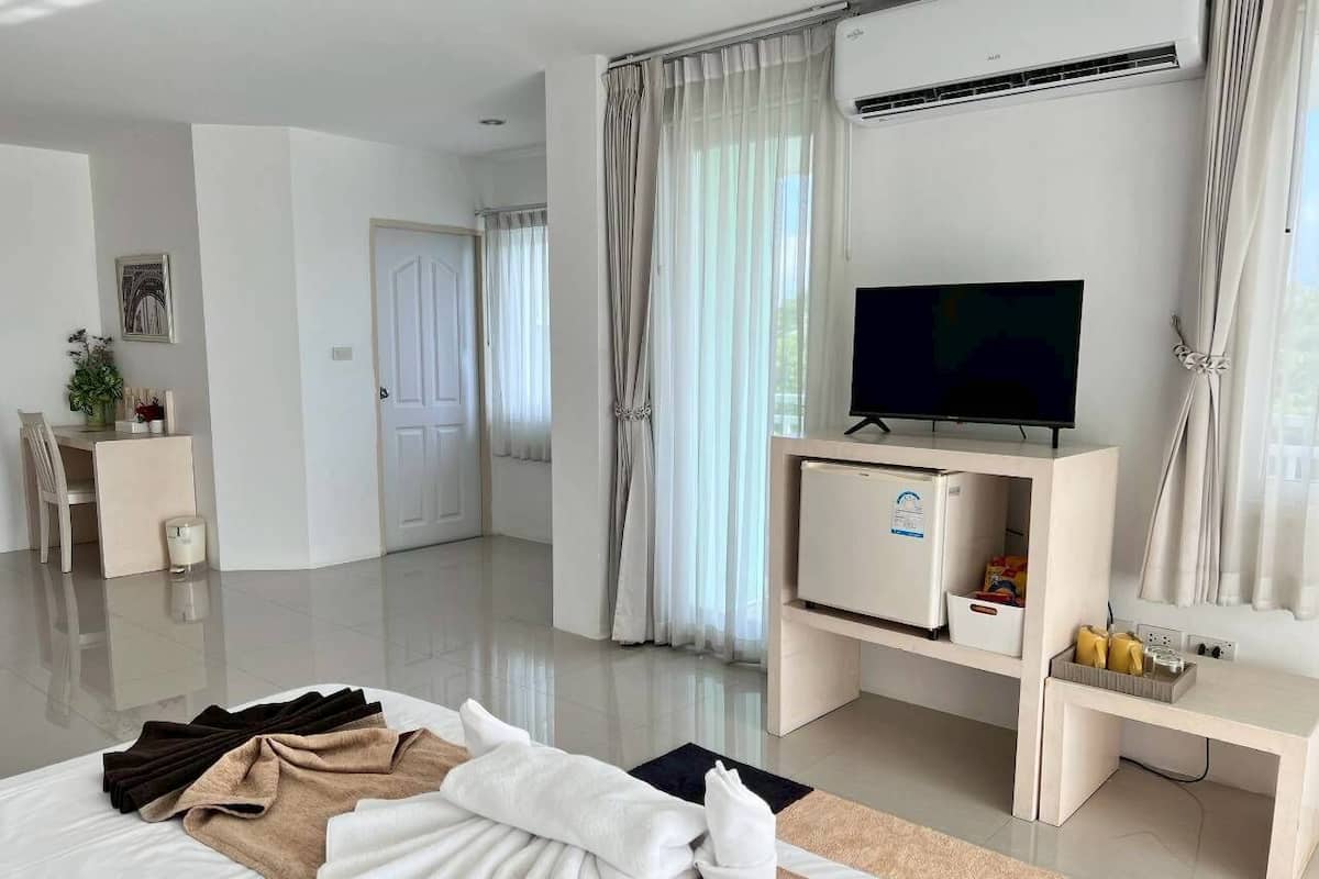 Habitación Deluxe | Escritorio, wifi gratis y ropa de cama