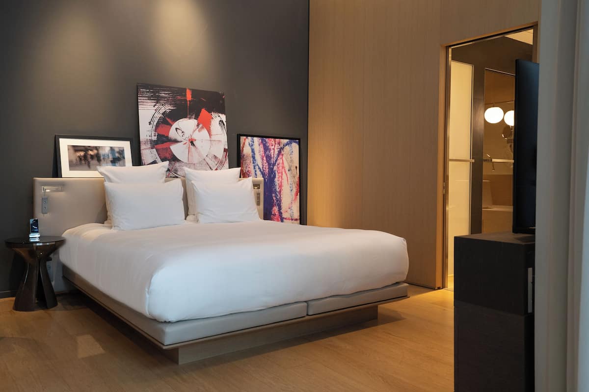 Junior Suite | 1 bedroom, hypo-allergenic bedding, down comforters, in-room safe
