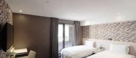 Standard Twin Room, City View | Down duvets, free minibar, individually decorated