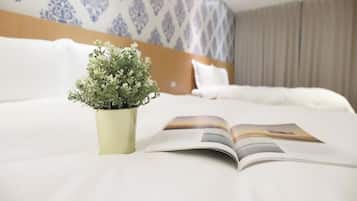 Down comforters, free minibar, individually decorated