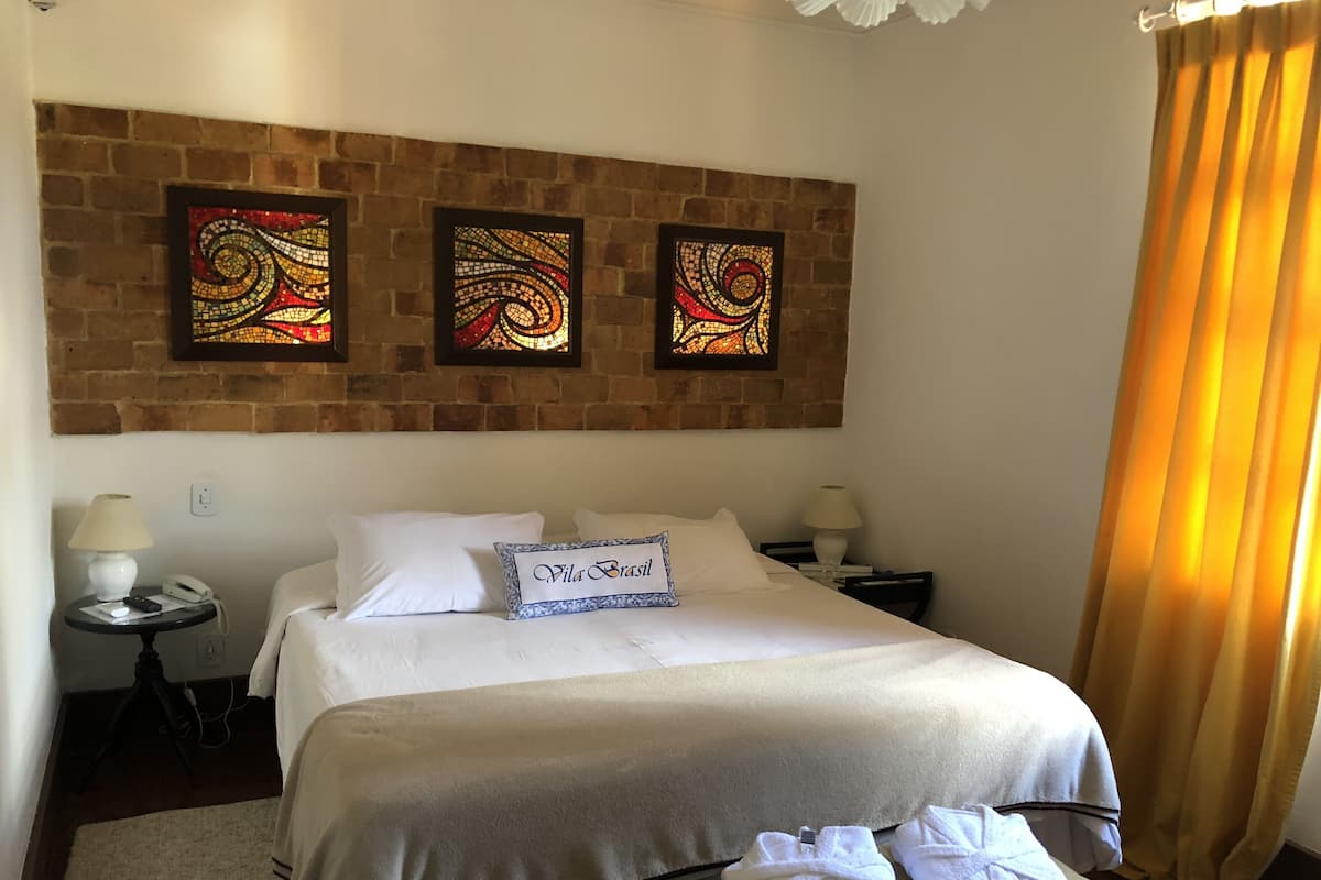 Superior Room | Minibar, in-room safe, individually decorated, blackout drapes