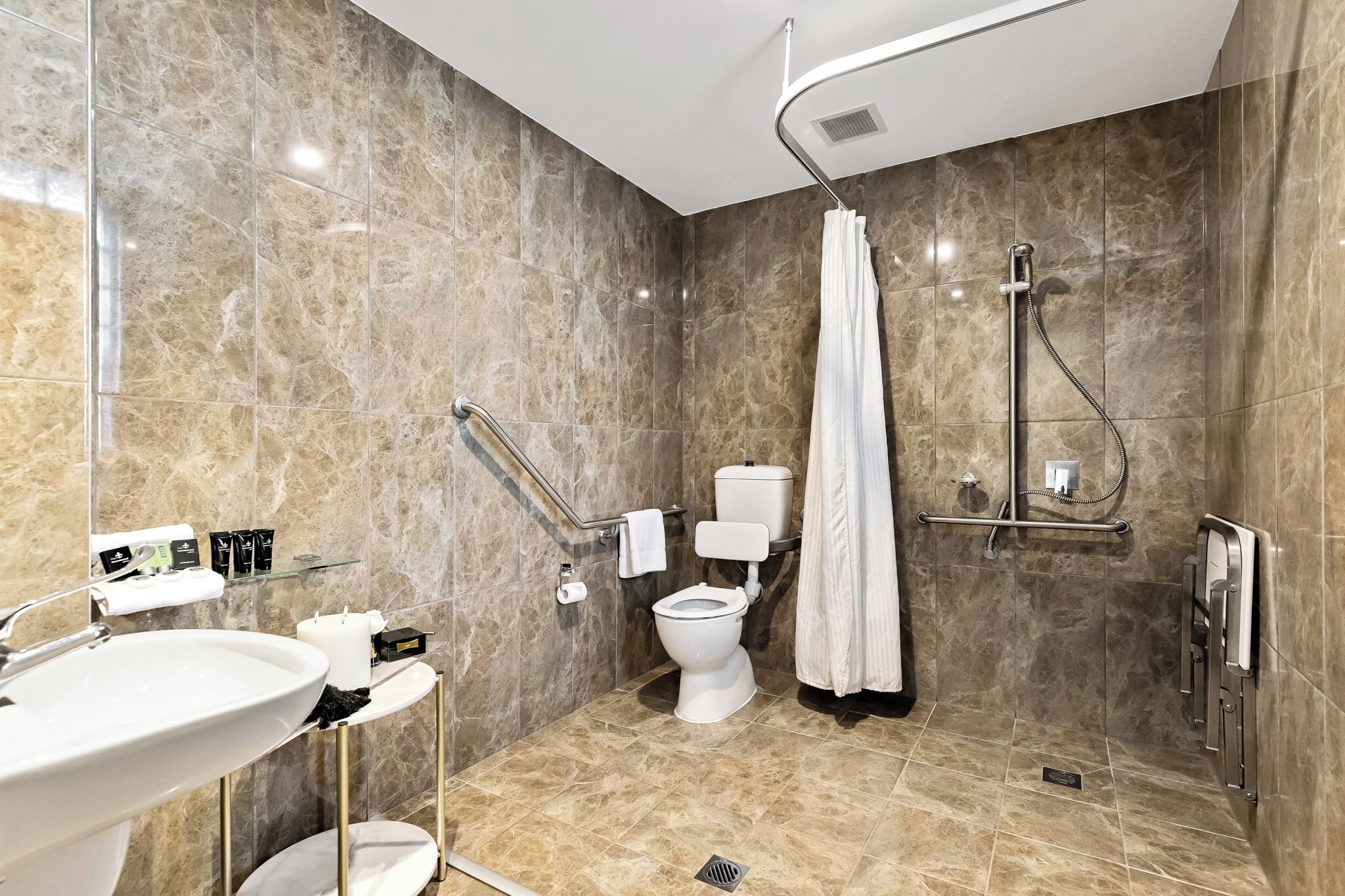 king family suite | bathroom | shower, free toiletries, hair dryer, towels