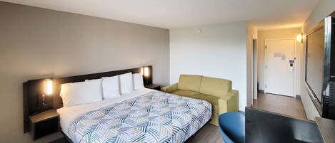 Bantalan ekstra lembut, meja kerja, Wi-Fi gratis, dan seprai linen