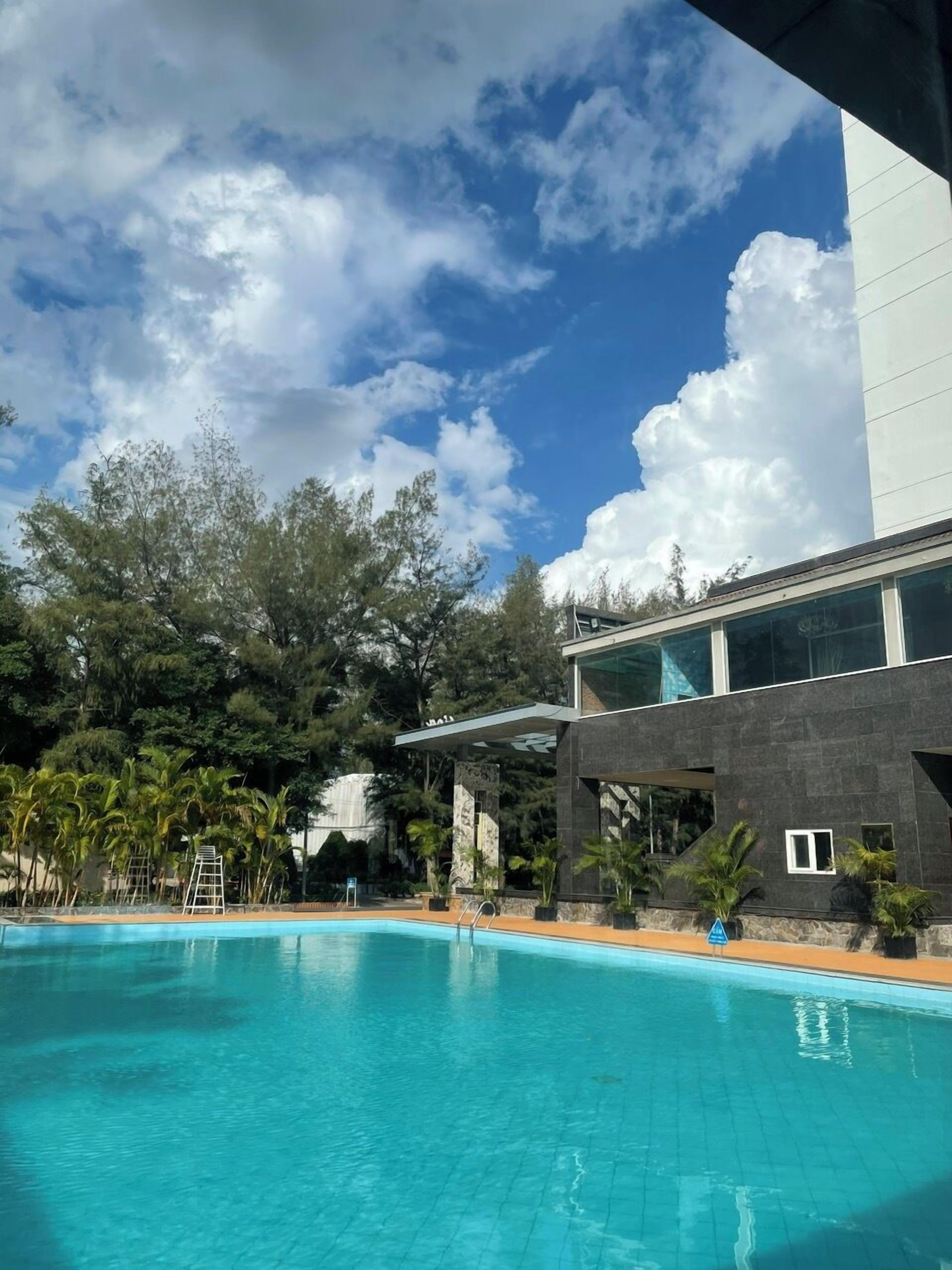 outdoor pool, pool umbrellas, pool loungers