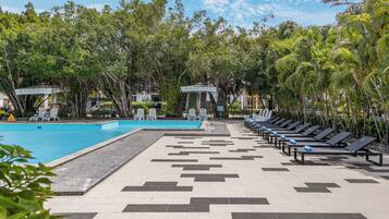 Outdoor pool, pool umbrellas, sun loungers