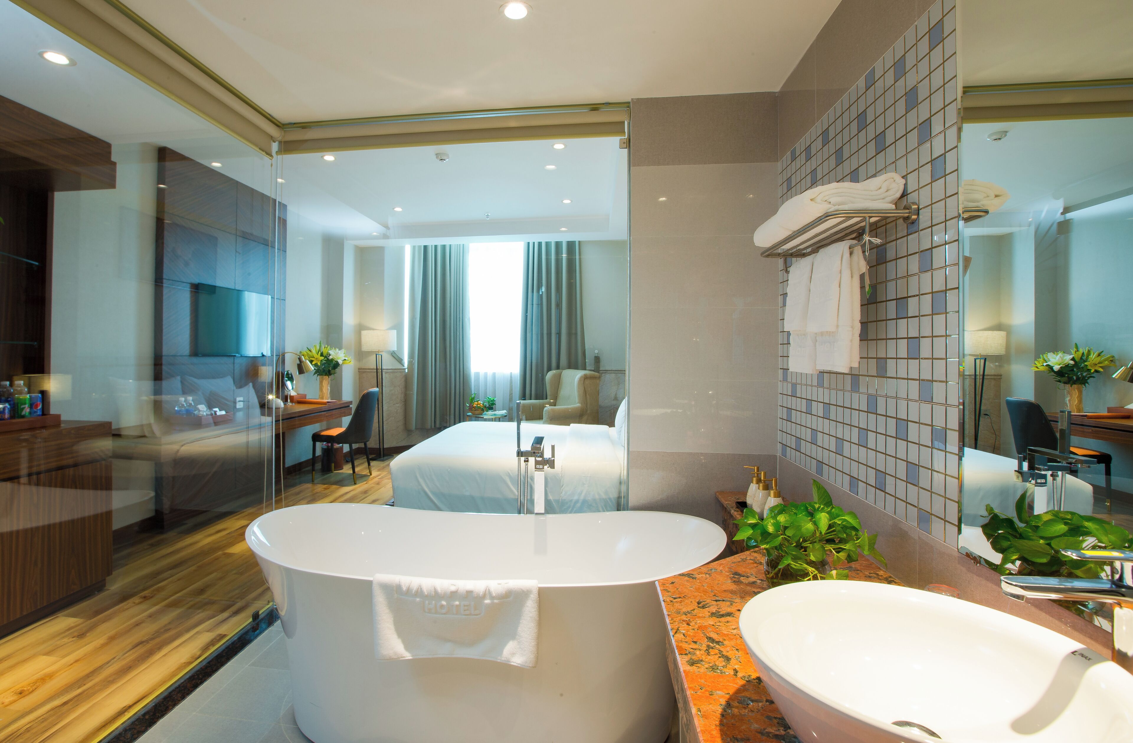 junior suite | bathroom | designer toiletries, hair dryer, bathrobes, slippers