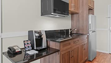 Suite, 1 Queen Bed, Non Smoking | Hypo-allergenic bedding, blackout curtains, soundproofing