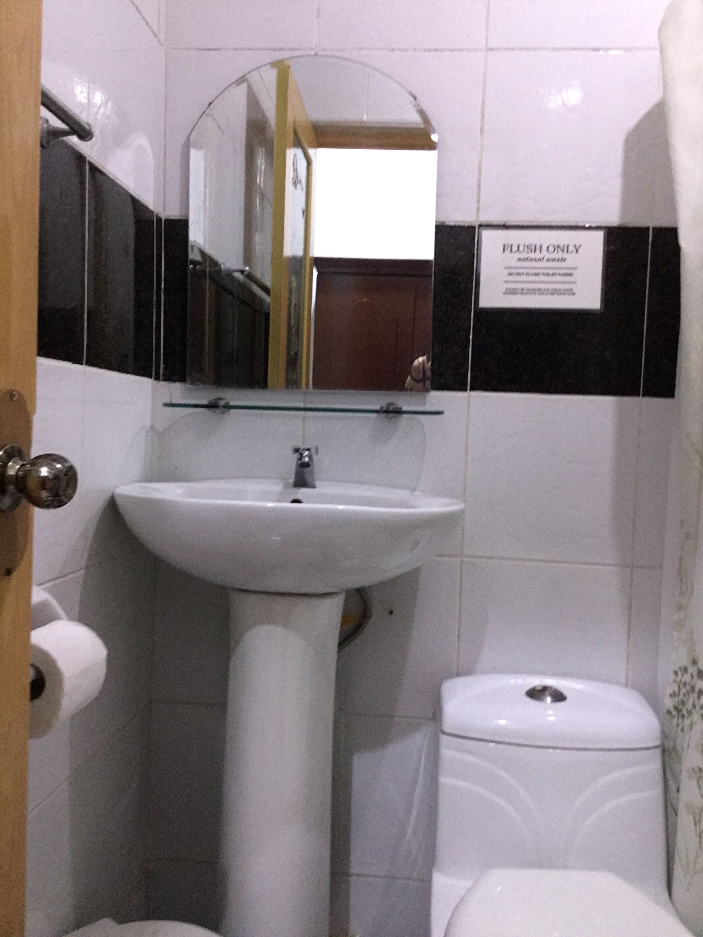 deluxe quad with balcony sunny | bathroom | shower, hair dryer, towels