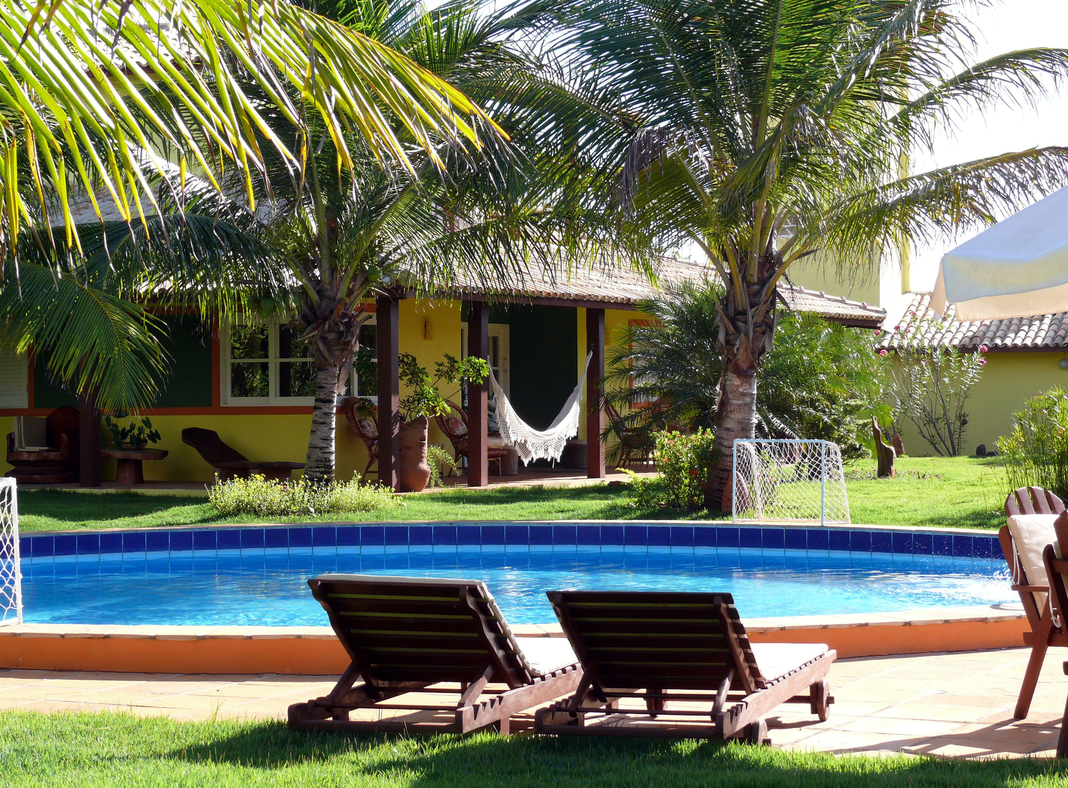 outdoor pool, pool umbrellas, pool loungers