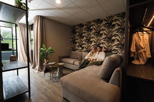 Gold Botanic Loft Deluxe | Living area | TV