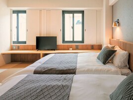 Escritorio, sistema de insonorización, wifi gratis y ropa de cama 