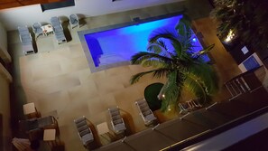 Outdoor pool, open 7 AM to 8 PM, pool umbrellas, pool loungers