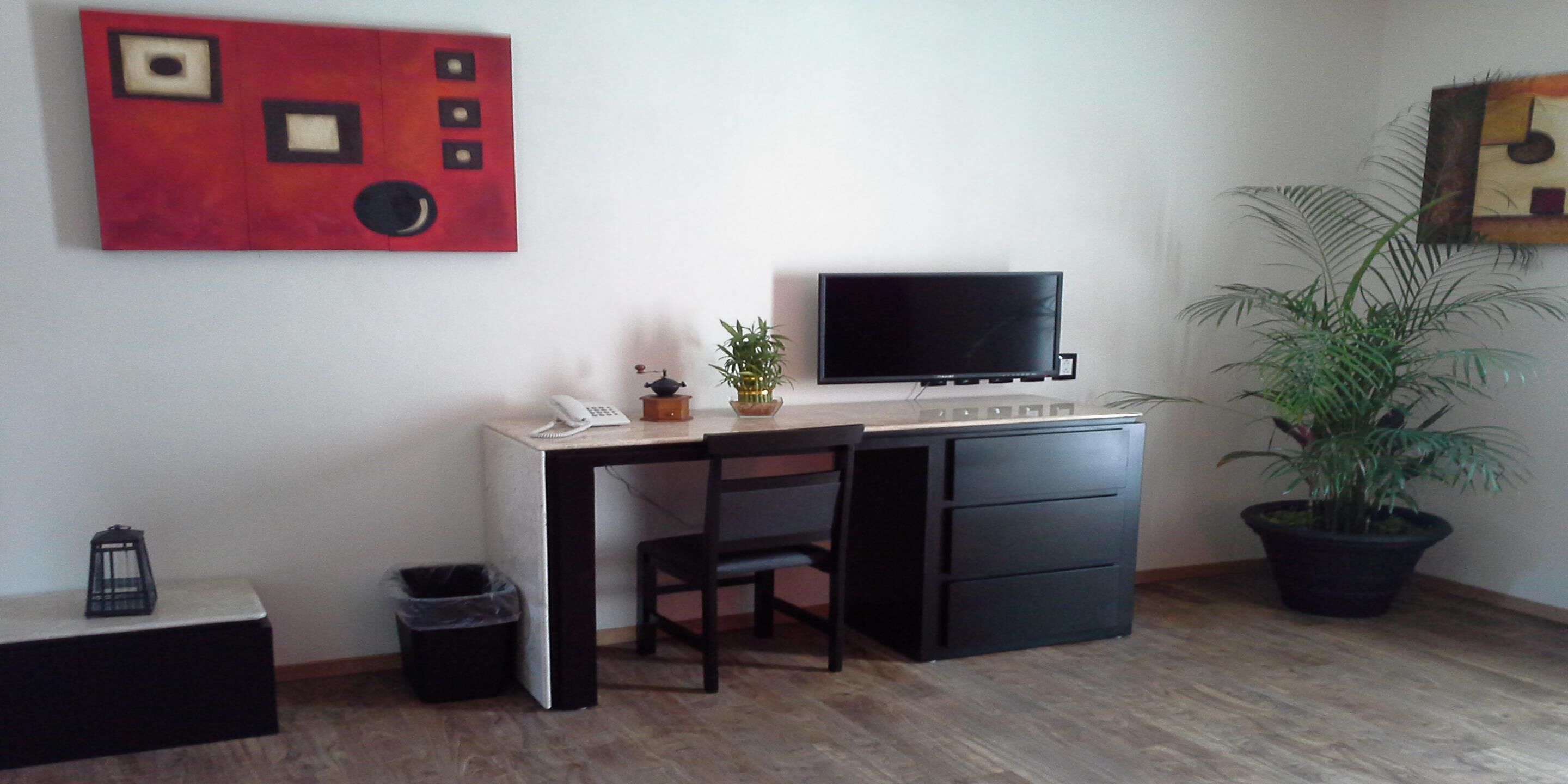 family room | in-room safe, desk, laptop workspace, iron/ironing board