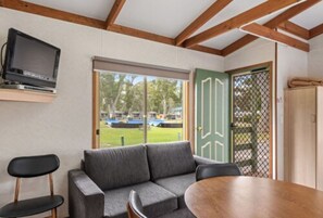 Economy 1 Bedroom Cabin - Sleeps 5 | Living room | 32-inch LCD TV with cable channels - Discovery Parks - Clare (Clare)