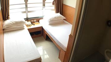 Blackout drapes, iron/ironing board, free WiFi, bed sheets