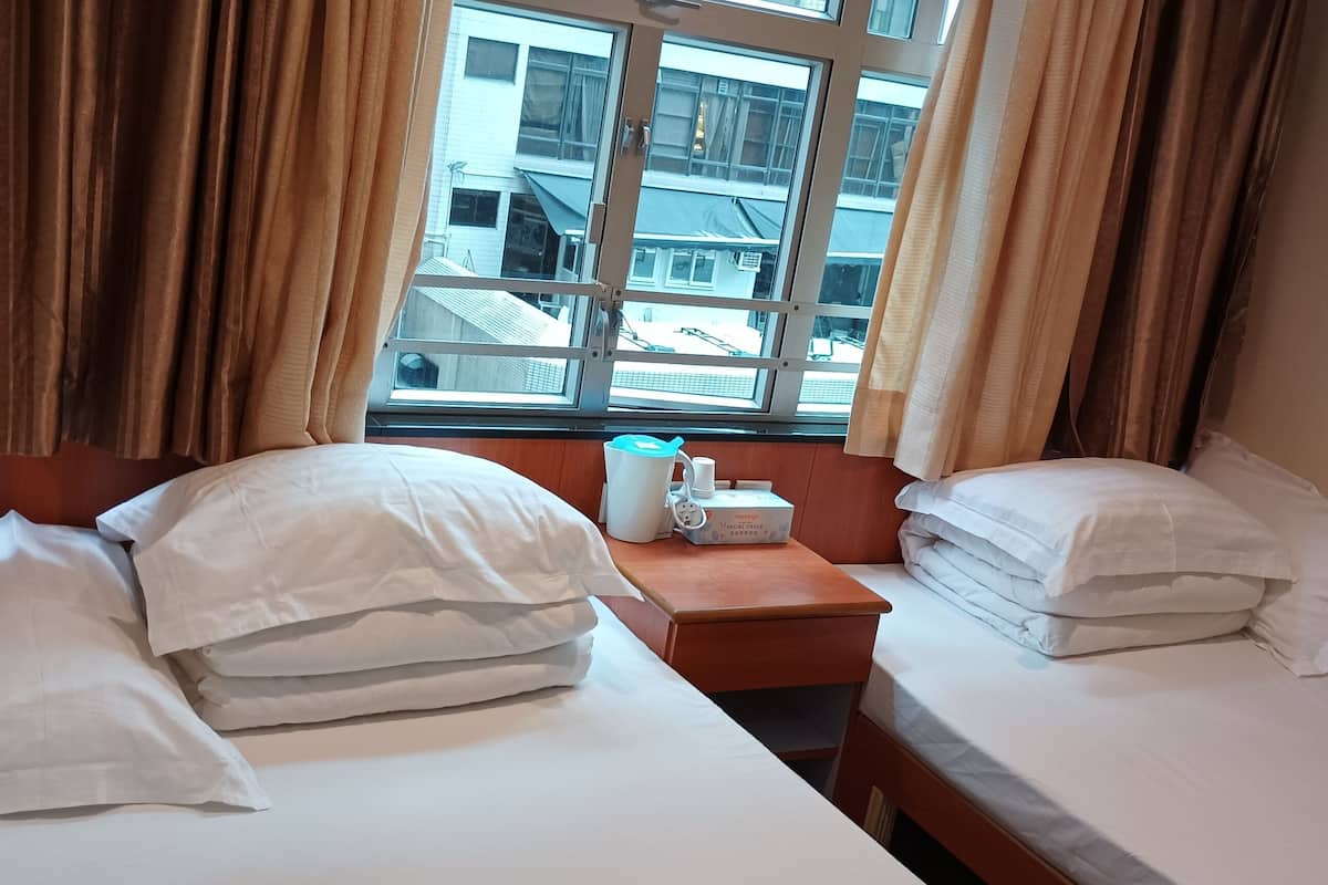 Blackout curtains, iron/ironing board, free WiFi, bed sheets